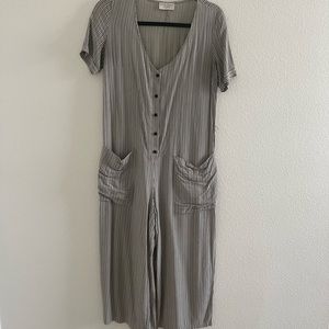 Jumper size Small with front pockets and front buttons!